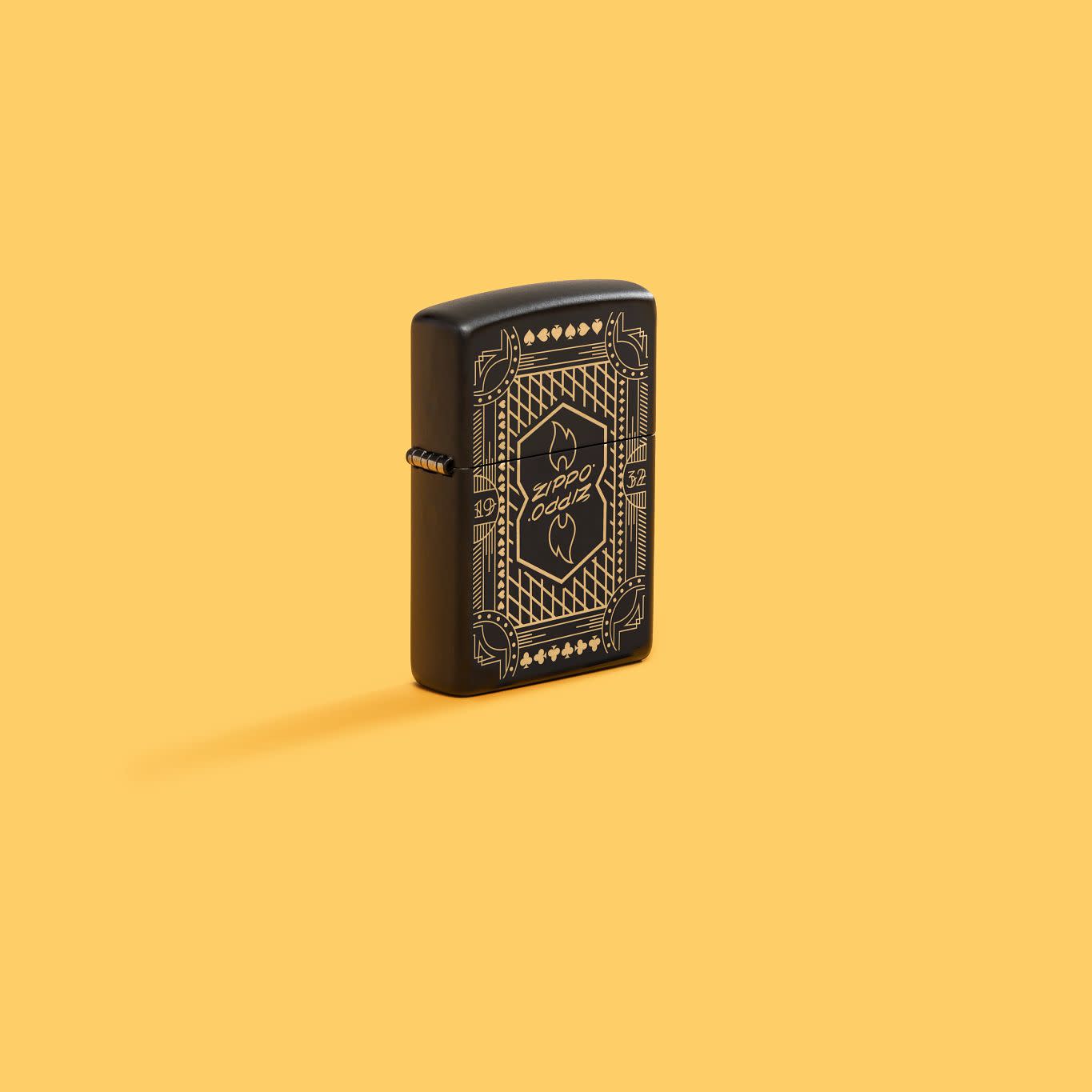 Lifestyle image of Zippo Lines Design Black Matte Windproof Lighter in a yellow scene.